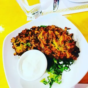 This is a zucchini, pancake with yogurt sauce.