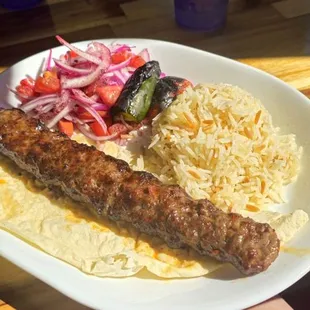 ADANA KEBAB Ground beef/lamb flavored with red peppers, seasoned with Chef blend char-grilled