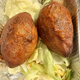 Kibbie (little grain footballs stuffed with seasoned meat and pine nuts)