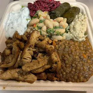 Fresh chicken rice lentil bowl with salad