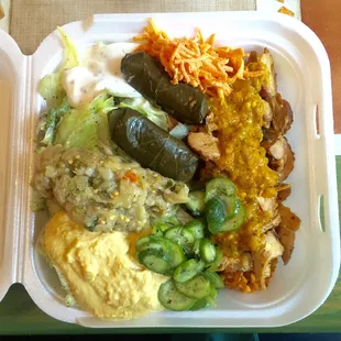 Meal 1: Chicken, salad, hummus, stewed eggplant, grape leaves, and complimentary carrots and cucumbers for being a first-time customer!