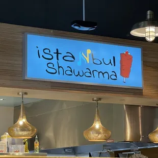 a sign above the counter