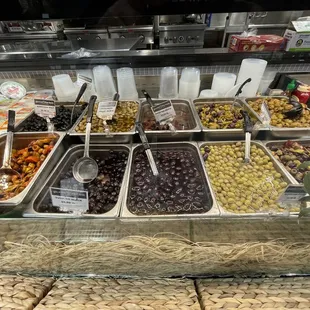 a variety of olives and olives
