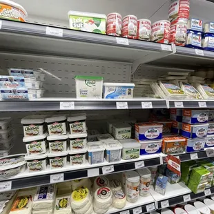 shelves of yogurt and dairy products