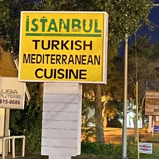Restaurant sign by the road