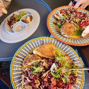 two plates of food on a table