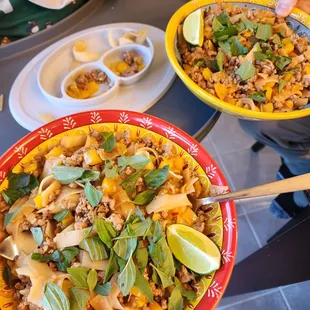 two bowls of food on a table