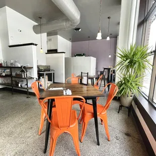 a view of a kitchen and dining area