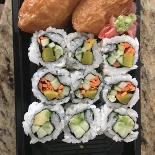 C7. Veggie Combo  (minus 3 pieces because I was hungry) ....12 pieces of veggie sushi with 2 inari...delicious! $9.99