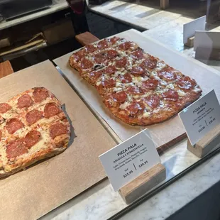 two pepperoni pizzas