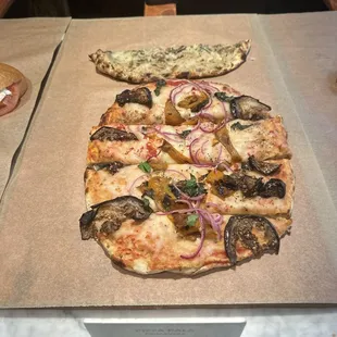 a variety of pizzas