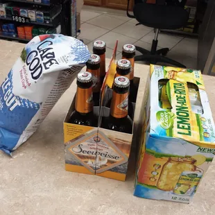 a box of sodas and a bag of chips