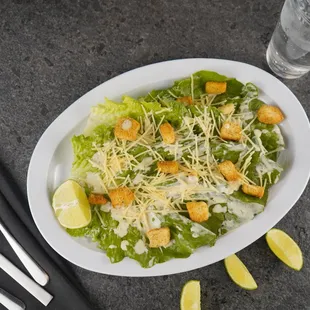 Ceasar salad with home made dressing, croutons and parmesan cheese.