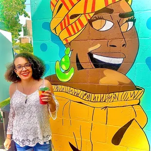 Just me and bob marley in front of the awesome mural on this business.