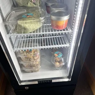 Fridge with vegan wraps, salad of the day and sea moss