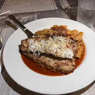 Eggplant Parmesan with rigatoni bolognese