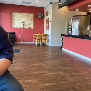 a woman sitting in a restaurant