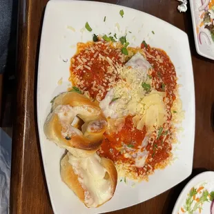 Lasagna with garlic knots on the side