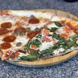 Pepperoni/sausage pizza &amp; spinach/mushrooms pizza