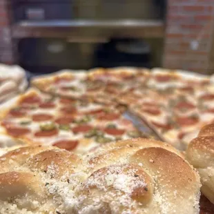 a pizza with pepperoni and cheese