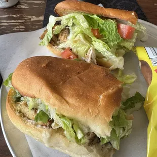 a sandwich and chips on a plate