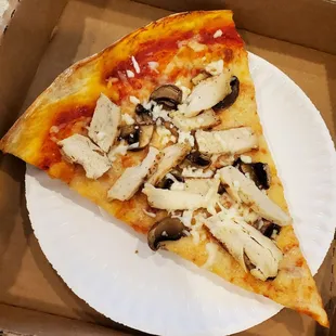 Chicken and mushrooms. They will add whatever toppings you want onto the cheese slice