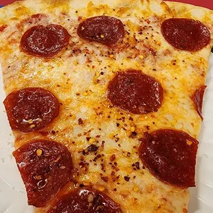 Pepperoni Slice with crushed peppers