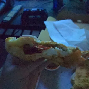 Some sausage and pepperoni calzone I didn&apos;t order. No spinach is in this.