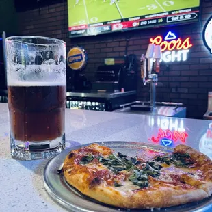 Great place to watch sports along side a cold one and delicious pizza