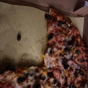 This is an olive pit. I bit down into it.  Fuck this place