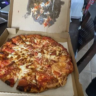 Pizza that got messed up during transport