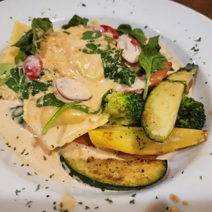 a plate of pasta and vegetables