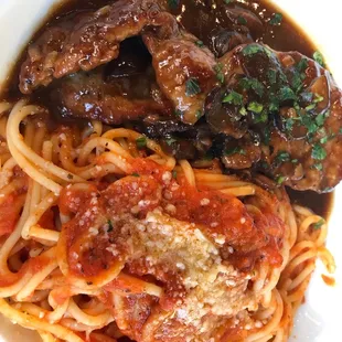 Veal scalapini with spaghetti