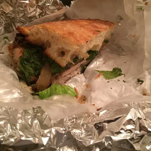 Half of a Grilled Chicken on ciabatta with caramelized onions! Mmmmmm! And it&apos;s ginormous!