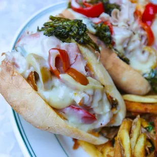 Porchetta, with fontina, broccolini, hots and garlic aioli