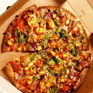 a whole pizza in a box