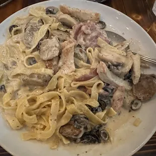 Fettuccini Carbonara with chicken and sausage! Always order it this way, a million times worth it!