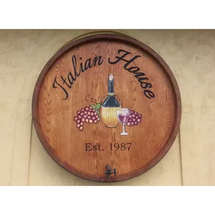 a wine barrel with a glass of wine