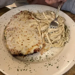 Chicken Parmesan with Fettuccini Alfredo Pasta (created)  This one was 4.5 out of 5!