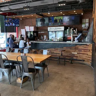 a restaurant with tables and chairs