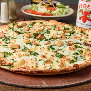 White Gourmet Alfredo Sauce , Spinach, Chicken , Roasted Garlic &amp; onion!