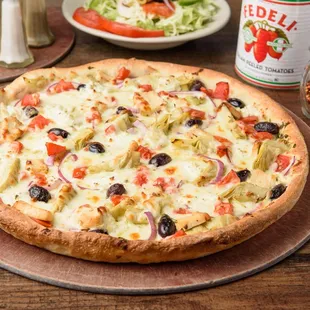 Greek Chicken Pie
Pesto sauce with Artichokes, Red onion, Tomato &amp; Ricotta Cheese