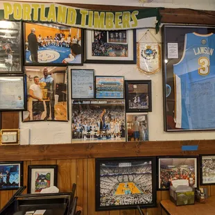 Inside. Dining room decor. Autographed Ty Lawson Denver Nuggets jersey. Picture of Harrison Barnes bringing the NBA trophy to IP3.