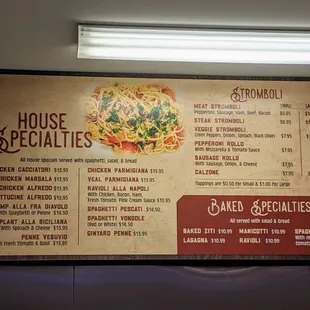 Inside. Wall menu 4 of 4. House specialties, stromboli, baked specialties.