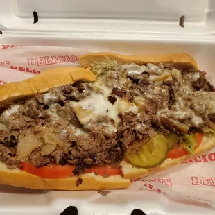 Cheesesteak ( w/ provolone cheese, tomatoes, onions, and pickles)