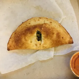 a half eaten pastry in a box