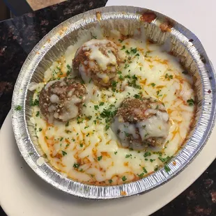 Meatballs In Sauce With Mozzarella Cheese