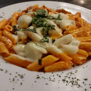 Penne Sephora. Served with Homemade Garlic Roll and Tossed Salad