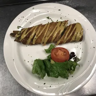 Tuscany asparagus: Asparagus wrapped in prosciutto,mozzarella cheese, deep fried and drizzle with honey glaze