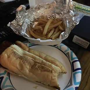 a hot dog and french fries